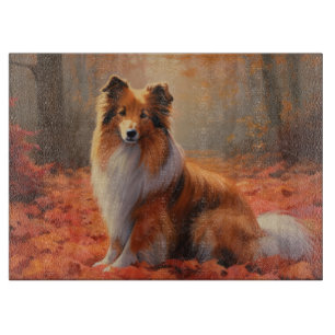 Planche À Découper Berger des Shetland dans les feuilles d'automne qu