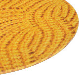 Planche À Découper Chandail en tricot orange, arrière - plan texturé. (Coin)