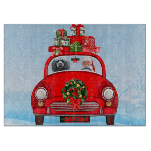 Planche À Découper Chien caniche dans une voiture avec le Père Noël 