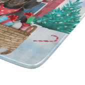 Planche À Découper Chien teckel dans la maison de Noël enneigée (Coin)