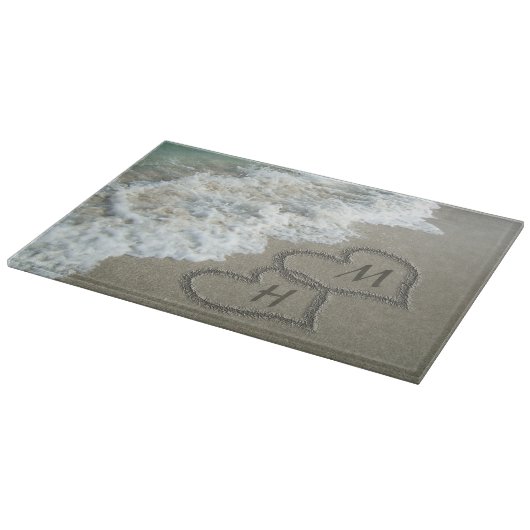 Planche À Découper Coeurs bloqués sur le sable de plage (Coin)