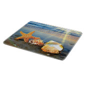 Planche À Découper Coquillages marins et étoiles de mer sur la plage (Coin)