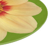 Planche À Découper Dahlia jaune sur la florale verte (Coin)