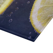 Planche À Découper Délicieuses tranches de citron dans l'eau (Coin)