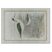 Planche À Découper Des tiltes noires au bord de l'eau (Devant)