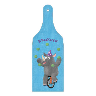 Planche À Découper Drôle rhinocéros mignon jonglant sur monocycle