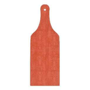 Planche à découper en verre orange choquant