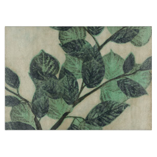 Planche À Découper Feuilles et succursales sur Arrière - plan de crèm