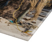 Planche À Découper Filets de pêche séchant sur la plage (Coin)