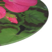 Planche À Découper Fleur De Géranium Rose Avec Boucles D'Eau Photo (Coin)
