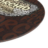 Planche À Découper Fleur florale d'orchidée au-dessus de nuage de mot (Coin)