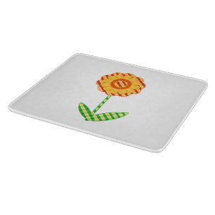 Planche à découper florale de plaid jaune-orange