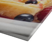 Planche À Découper Gâteau de gaufre avec la baie fraîche (Coin)