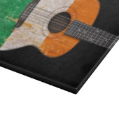 Planche À Découper Guitare acoustique âgée et utilisée de drapeau (Coin)