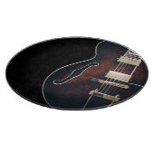 Planche À Découper Guitare Électrique Sur Fond Noir (Coin)