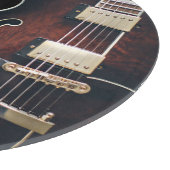 Planche À Découper Guitare Électrique Sur Fond Noir (Coin)