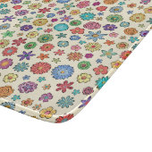 Planche à découper heureuse de fleurs (Coin)