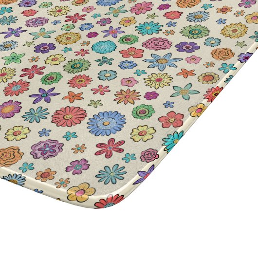 Planche à découper heureuse de fleurs (Coin)
