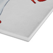 Planche À Découper Infirmière blonde dans l'uniforme tirant vers le (Coin)