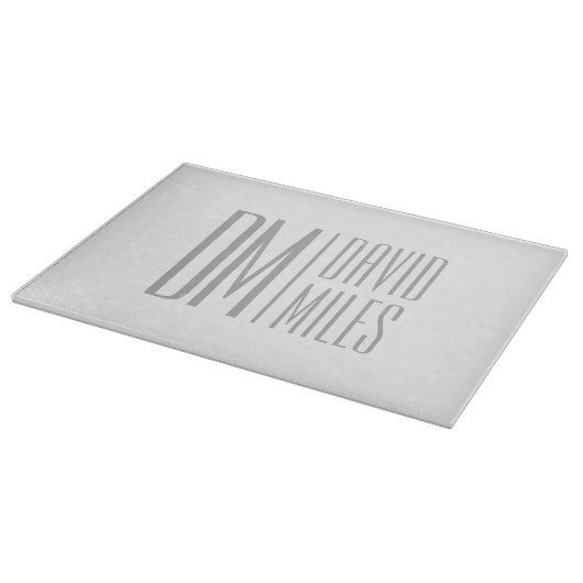 Planche À Découper Initiales et logo de nom gris minimal et moderne é (Coin)
