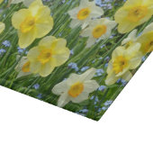 Planche à découper jaune d'impression florale de (Coin)