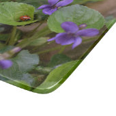 Planche À Découper Ladybug sur les fleurs de violet doux (Coin)