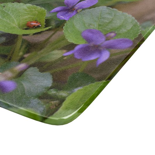 Planche À Découper Ladybug sur les fleurs de violet doux (Coin)