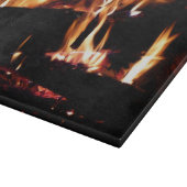 Planche À Découper Logs dans la cheminée Photographie de feu chaud (Coin)