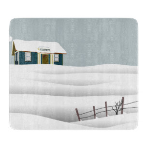 Planche À Découper Maison dans un paysage enneigé