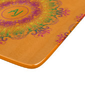Planche À Découper Mandala Monogram.arrière - plan orange. (Coin)
