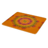 Planche À Découper Mandala Monogram.arrière - plan orange. (Coin)