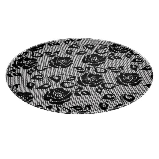 Planche À Découper motif en dentelle noire sur arrière - plan blanc (Coin)