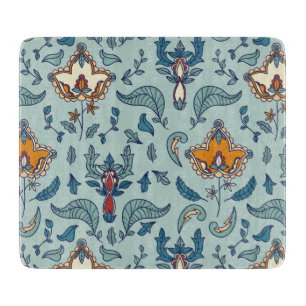 Planche À Découper Motif floral orné sur fond bleu pâle