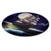 Planche À Découper Navire illuminé sur l'océan sous la lune (Coin)