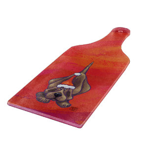 Planche À Découper Noel de Chien À La Hache Sur Rouge