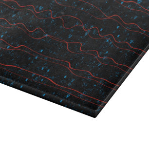 Planche À Découper Noir et bleu avec les lignes rouges onduleuses