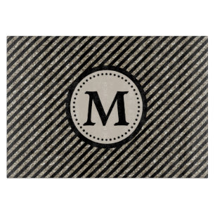 Planche à découper noire de rayure de parties