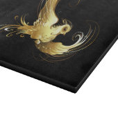Planche À Découper Oiseau d'or sur Arrière - plan noir (Coin)
