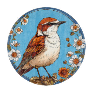 Planche À Découper Oiseau encadré par des fleurs vibrantes
