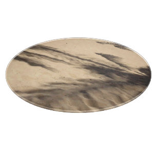 Planche À Découper Ombres sur le sable