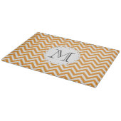 Planche à découper orange de monogramme de Chevron (Coin)