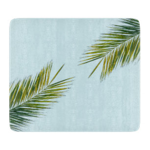 Planche À Découper Palmier Vert Tropical sur Fond Bleu Clair