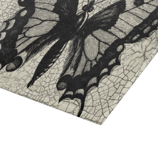 Planche À Découper Papillon noir et blanc sur Arrière - plan fissuré (Coin)