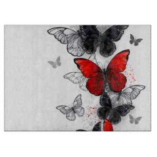 Planche À Découper Papillons noirs et rouges volants