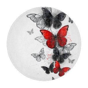 Planche À Découper Papillons noirs et rouges volants