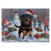 Planche À Découper Rottweiler coule en neige avec Casquette de Noël (Devant)