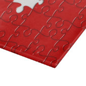 planche à découper rouge de puzzle (Coin)
