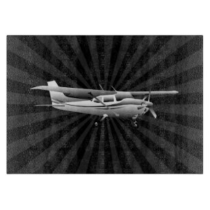 Planche À Découper Soleil d'éclatement volant de la silhouette de Ces