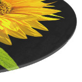 Planche À Découper Tournesol lumineux sur l'arrière - plan noir (Coin)