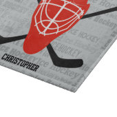 Planche À Découper Typographie rouge de casque et de bâtons de hockey (Coin)